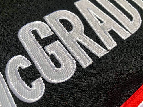 Tracy McGrady Toronto Raptors Throwback Jersey MN